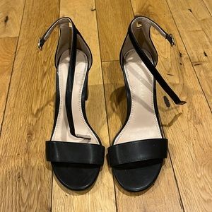 Single strap black block heels